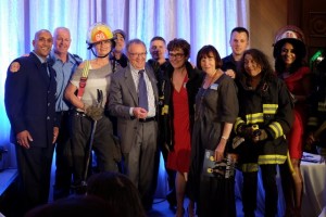 Don James, Chairman & Chief Executive Officer, Deeley Harley-Davidson® Canada, celebrates the support of local Vancouver Firefighters who donated an evening in-home dinner to the live auction.